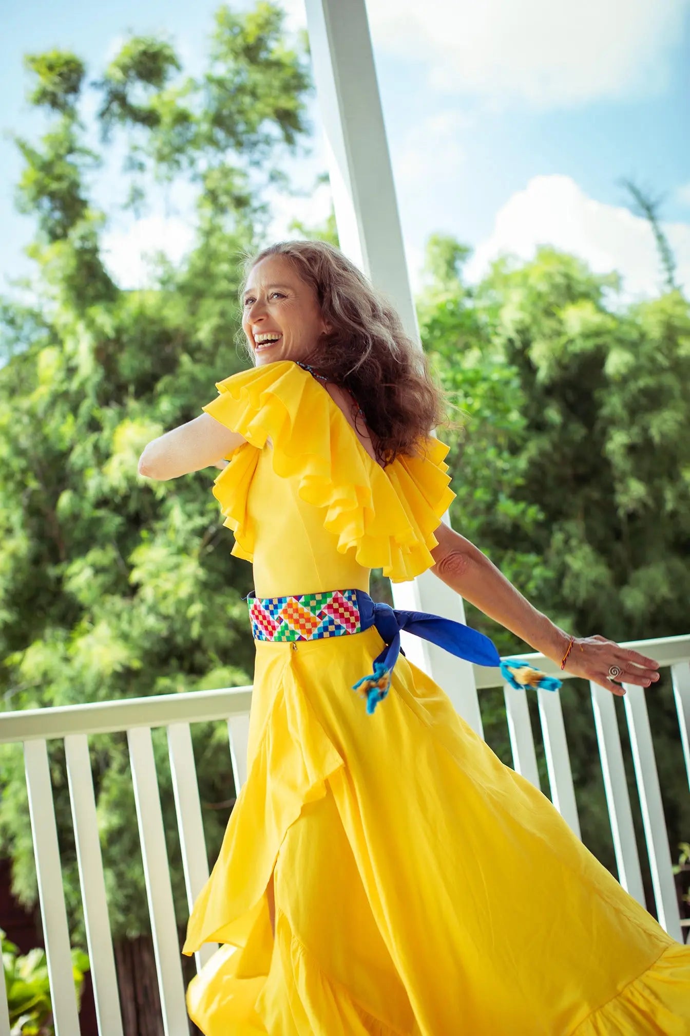 Rainbow Belt and yellow dress dancing